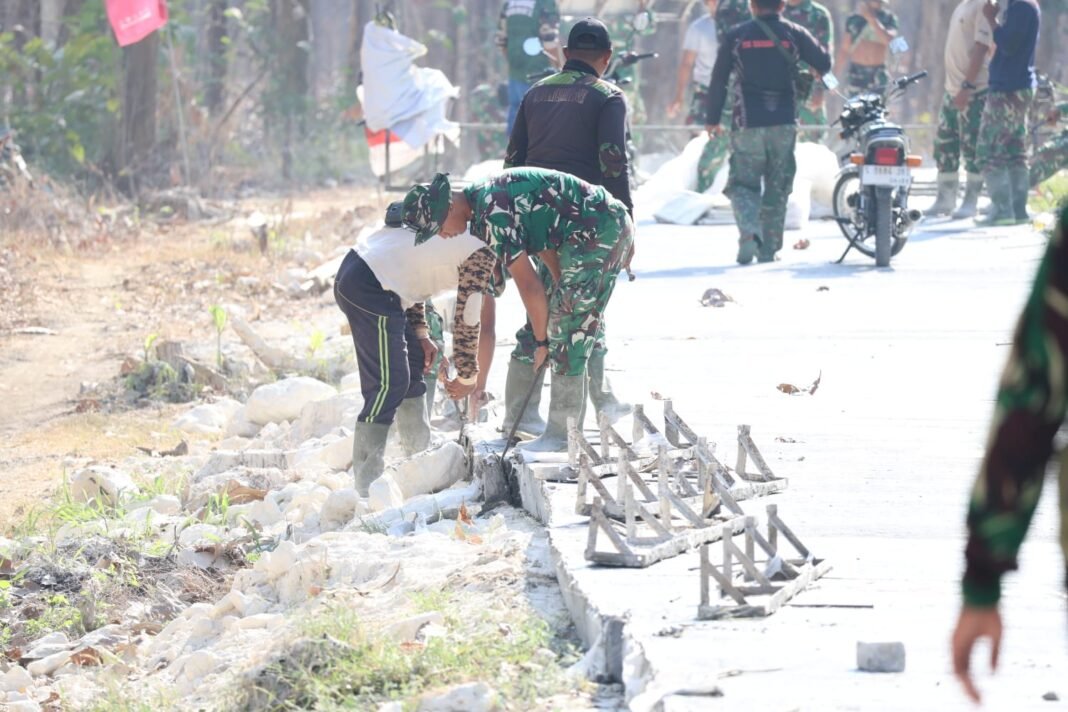 Proyek Jalan TMMD 129 di Desa Tlemang: Begisting Dibongkar dengan Teliti