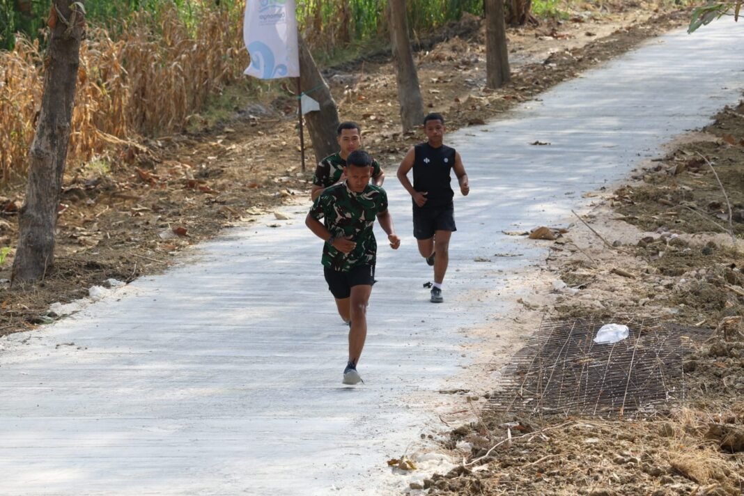 Rutinitas Sehat Prajurit TMMD 129 dengan Jogging Sore