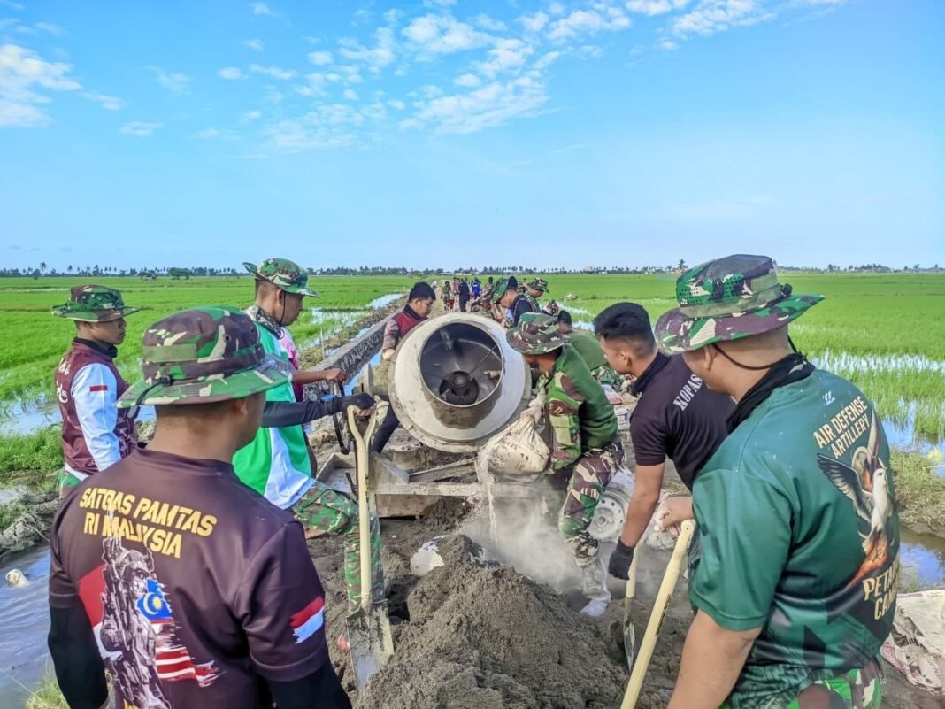 Menggugah Semangat, Mesin Molen Menjadi Andalan Satgas TMMD Ke-129