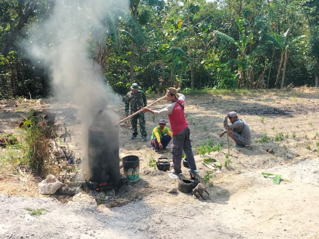 Keberhasilan Satgas TMMD Ke-129: Pekerjaan Pengolahan Aspal untuk Konstruksi