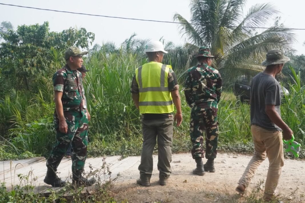 Transformasi Jalan Desa Parumpanai Melalui Program TMMD