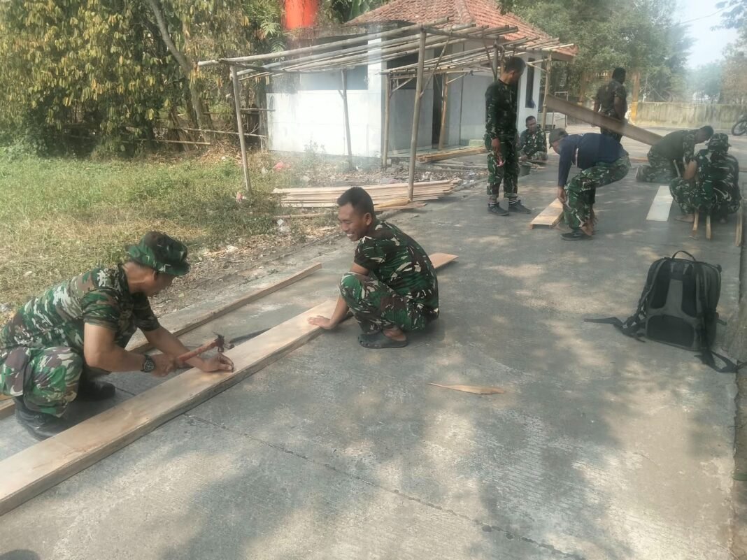 Semangat Kebersamaan dan Ketelitian Satgas TMMD dalam Pembangunan Infrastruktur
