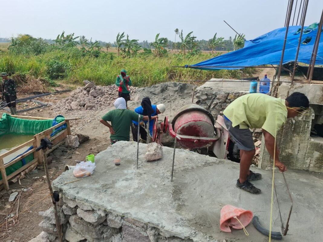 PROGRES PEMBANGUNAN JEMBATAN GANTUNG SIPODECENG: PONDASI KAIT ANGIN DAN BETON DITERAPKAN